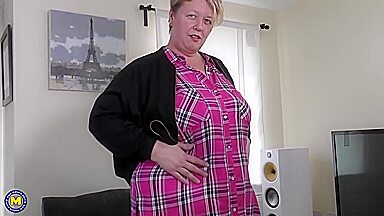 Lesley in British mature BBW showing off her big tits