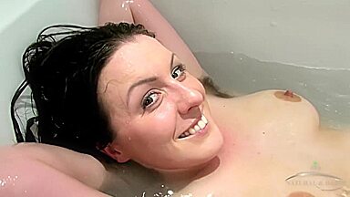 Hairy Jenna Brooke-Benjamin takes a bath.
